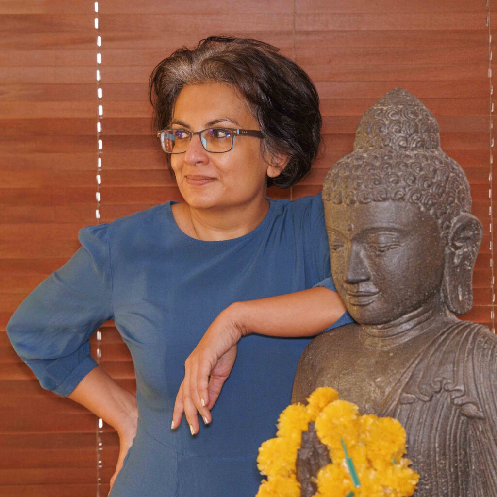 Dipali Bagga with Buddha Statue